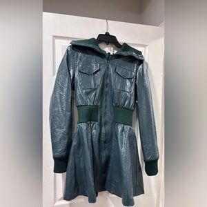 Green glossy mini dress jacket.